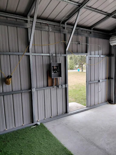 Panel and wiring installed in a metal building