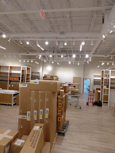 Retail buildout with track lighting and recessed fixtures